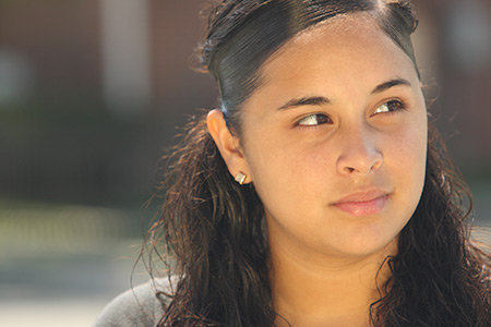 A contemplative young woman